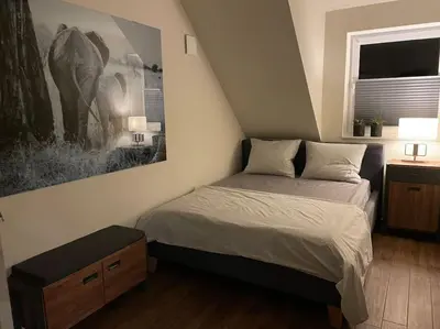 Ein Bett oder Betten in einem Zimmer der Unterkunft Excl. Maisonette Ferienwohnung