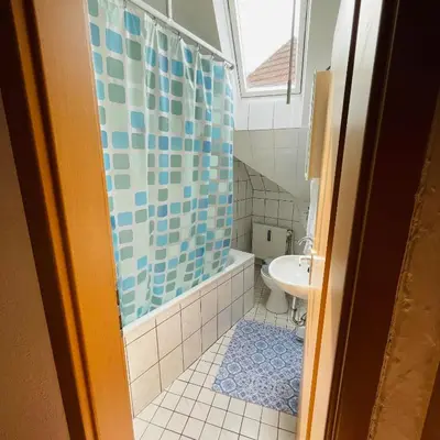 Ein Badezimmer in der Unterkunft Nette Kuschelige Wohnung 2