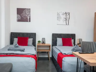 Ein Bett oder Betten in einem Zimmer der Unterkunft Serviceroom24 - Apartment 2 in Recklinghausen Hoch WLAN - Smart-TV - 24-7 Check-in und Küche