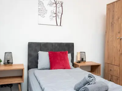 Ein Bett oder Betten in einem Zimmer der Unterkunft Serviceroom24 - Apartment 2 in Recklinghausen Hoch WLAN - Smart-TV - 24-7 Check-in und Küche