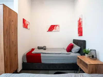Ein Bett oder Betten in einem Zimmer der Unterkunft Serviceroom24 - Apartment 2 in Recklinghausen Hoch WLAN - Smart-TV - 24-7 Check-in und Küche
