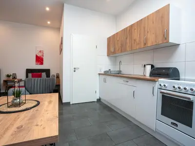 Küche/Küchenzeile in der Unterkunft Serviceroom24 - Apartment 2 in Recklinghausen Hoch WLAN - Smart-TV - 24-7 Check-in und Küche