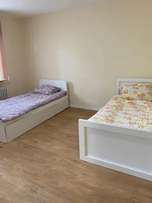 Ein Bett oder Betten in einem Zimmer der Unterkunft FeWo Ibis