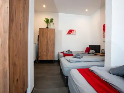Ein Bett oder Betten in einem Zimmer der Unterkunft Serviceroom24 - Apartment 3 in Recklinghausen Hoch WLAN - Smart-TV - 24-7 Check-in und Küche