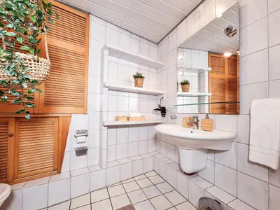 Ein Badezimmer in der Unterkunft Alpha Apartments