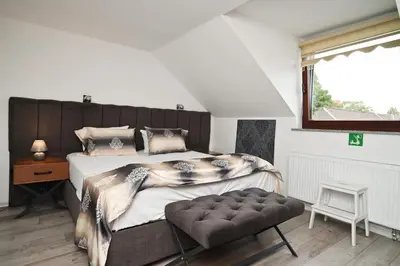 Ein Bett oder Betten in einem Zimmer der Unterkunft Ferienwohnung&Aparts By kispet group hotels in Oberhausen