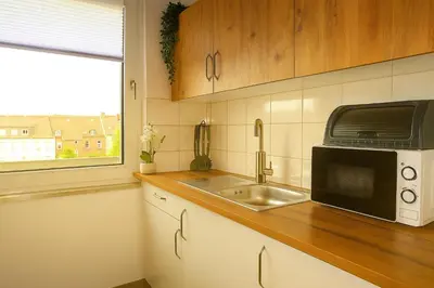 Küche/Küchenzeile in der Unterkunft Livemore24 - Apartment 2 in Duisburg WLAN - Smart-TV - 24-7 Check-in und Küche