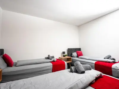 Ein Bett oder Betten in einem Zimmer der Unterkunft Serviceroom24 - Apartment 1 in Recklinghausen WLAN - Smart-TV - 24-7 Check-in und Küche