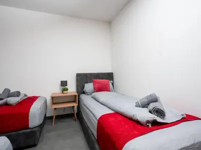 Ein Bett oder Betten in einem Zimmer der Unterkunft Serviceroom24 - Apartment 1 in Recklinghausen WLAN - Smart-TV - 24-7 Check-in und Küche