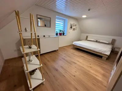 Ein Bett oder Betten in einem Zimmer der Unterkunft Cozy apartment in Haltern am See