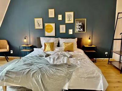 Ein Bett oder Betten in einem Zimmer der Unterkunft Stylish im Altbau, Netflix, Sonos, nahe 3M und Vorwerk
