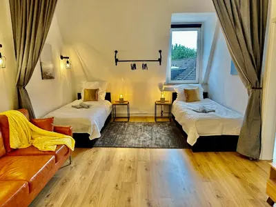 Ein Bett oder Betten in einem Zimmer der Unterkunft Stylish im Altbau, Netflix, Sonos, nahe 3M und Vorwerk