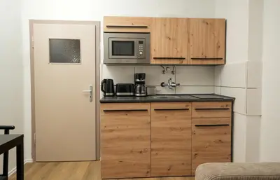 Küche/Küchenzeile in der Unterkunft SHIN APARTMENTS