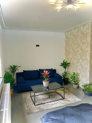 Ein Sitzbereich in der Unterkunft Modernes Apartment am Marktplatz