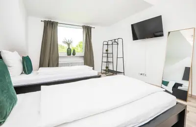 Ein Bett oder Betten in einem Zimmer der Unterkunft Kurzzeitglück 24h Self Check-In MH01