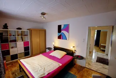 Ein Bett oder Betten in einem Zimmer der Unterkunft Air Boardinghouse Tulip Stockum, zu Fuß - 3 Minuten zur Messe