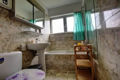Ein Badezimmer in der Unterkunft Air Boardinghouse Tulip Stockum, zu Fuß - 3 Minuten zur Messe