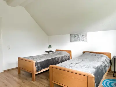 Ein Bett oder Betten in einem Zimmer der Unterkunft Im Herzen von Wermelskirchen