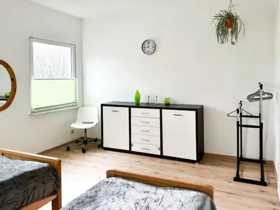 Ein Bett oder Betten in einem Zimmer der Unterkunft Im Herzen von Wermelskirchen