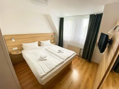 Ein Bett oder Betten in einem Zimmer der Unterkunft Limok Rooms Hamm