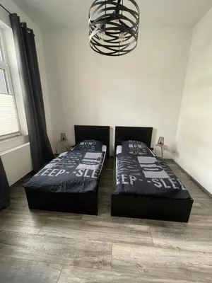 Ein Bett oder Betten in einem Zimmer der Unterkunft Ferienapartment Essen
