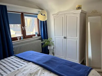 Ein Bett oder Betten in einem Zimmer der Unterkunft Gemütliches Apartment für Messe, Job & Kurzurlaub im Grünen, Nähe Düsseldorf
