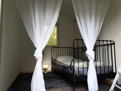 Ein Bett oder Betten in einem Zimmer der Unterkunft Romantischer Bauwagen im Grünen