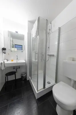 Ein Badezimmer in der Unterkunft Hotel Central
