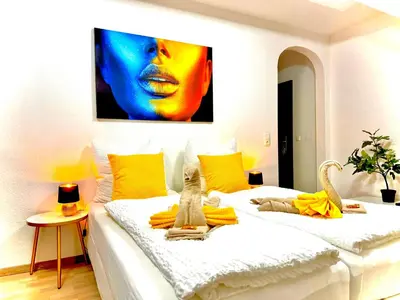 Ein Bett oder Betten in einem Zimmer der Unterkunft Zuhause im Ruhrgebiet 3 mit Balkon