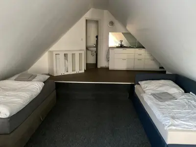 Ein Bett oder Betten in einem Zimmer der Unterkunft Warzalas Apartement 2 Ferienwohnung