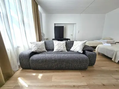 Ein Bett oder Betten in einem Zimmer der Unterkunft Airport Messe Apartments