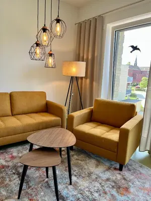 Ein Sitzbereich in der Unterkunft Appartements Haus Augustinus