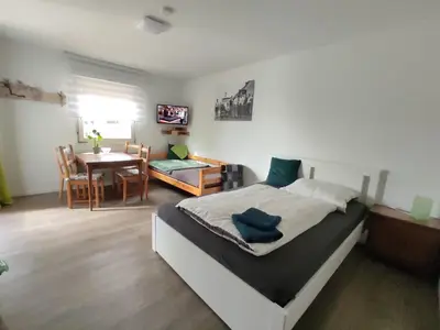 Ein Bett oder Betten in einem Zimmer der Unterkunft Gästewohnung WaSa
