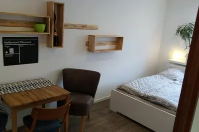 Ein Bett oder Betten in einem Zimmer der Unterkunft Gästewohnung WaSa