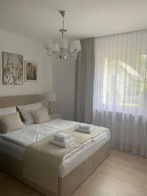 Ein Bett oder Betten in einem Zimmer der Unterkunft Apartment Naturjuwel