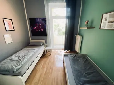 Ein Sitzbereich in der Unterkunft Gemütliche Zimmer - Messe Gruga