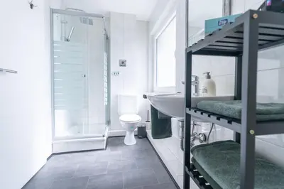 Ein Bett oder Betten in einem Zimmer der Unterkunft Essens Grüne Mitte , Direkt an der KEM Klinik, Freie Parkplätze und Netflix