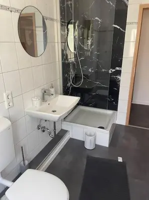 Ein Badezimmer in der Unterkunft Stadtwohnung im Luisenviertel