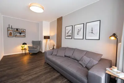 Ein Sitzbereich in der Unterkunft TANIC Deluxe Apartment Garden Central Industrial Fair