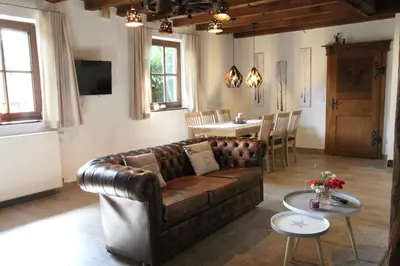 Ein Sitzbereich in der Unterkunft Ferienhaus Schulze Beikel mit Garten & Terrasse - Borken-Marbeck