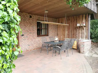 Ein Patio oder anderer Außenbereich in der Unterkunft Ferienhaus Schulze Beikel mit Garten & Terrasse - Borken-Marbeck