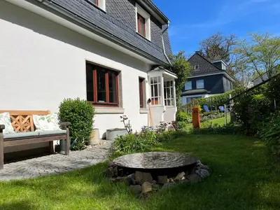 Ein Garten an der Unterkunft Ferienhaus Brinker Bleibe