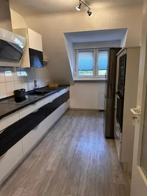 Küche/Küchenzeile in der Unterkunft A&V Apartments Wunderschöne Rheinblick Wohnung zum entspannen Apt Ela