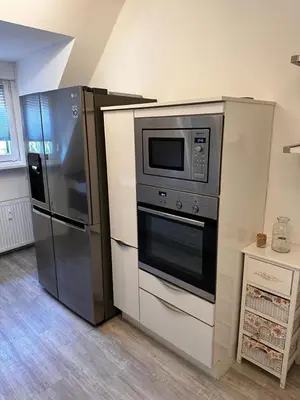 Küche/Küchenzeile in der Unterkunft A&V Apartments Wunderschöne Rheinblick Wohnung zum entspannen Apt Ela