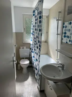 Ein Badezimmer in der Unterkunft Moderne Service Apartment AVD3