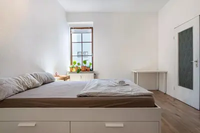 Ein Bett oder Betten in einem Zimmer der Unterkunft NEXT HOME - FREE Parking & WiFi - Badewanne