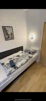 Ein Bett oder Betten in einem Zimmer der Unterkunft Moderne Monteurzimmer Vu