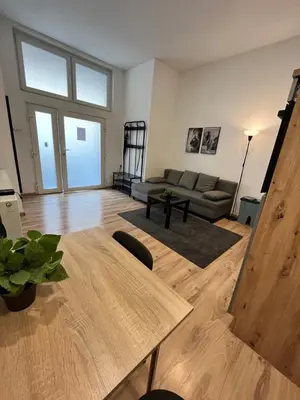 Ein Sitzbereich in der Unterkunft Apartment Central 10B 40qm Wi-Fi free Parking calm back house