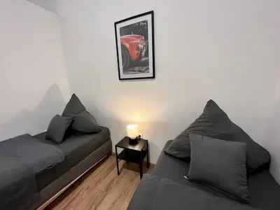 Ein Sitzbereich in der Unterkunft Apartment Central 10B 40qm Wi-Fi free Parking calm back house
