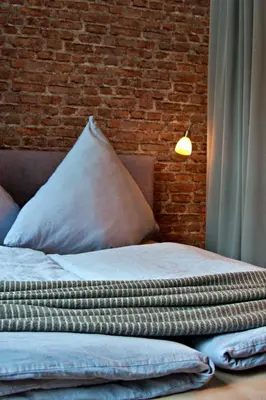 Ein Bett oder Betten in einem Zimmer der Unterkunft Industrial Style 77qm mit Balkon